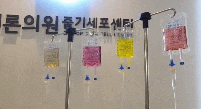 편도 상태 확인과 독감 검사 후 맞춤 수액을 준비하는 모습